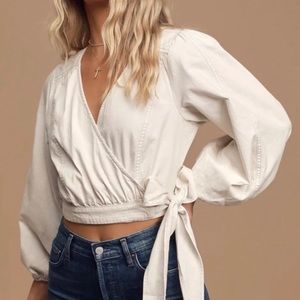 Never worn Sophie Free People wrap top in off-white/cream.